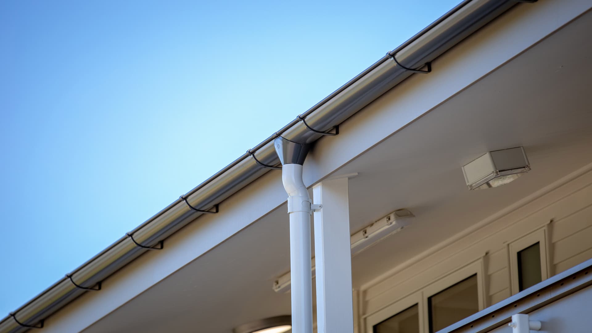 Half-round gutter system solution used on a house